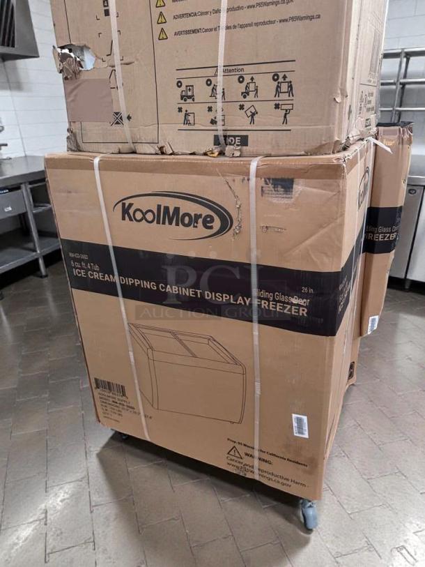 Brand new KoolMore KM-ICD-26SD ice cream dipping cabinet, 6 cu. ft., 4 tub, UL listed, unopened box on wheels.