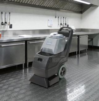 Brand new Commercial Cleaning Equipment portable carpet extractor, UL Listed, never used, in original packaging.