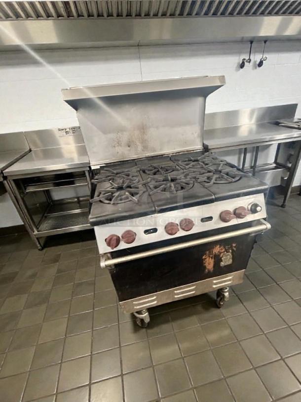 6-burner gas range with oven, NSF certified, commercial grade, in exceptional condition, fully operational, USA made.