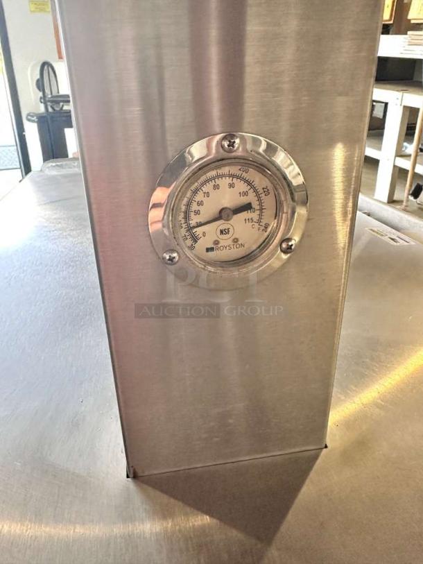 Royston 72" heated hot food island, NSF certified, stainless steel, with temperature gauge, in outstanding condition.