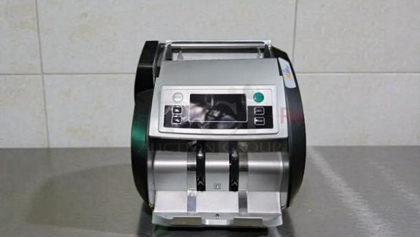 Royal Sovereign RBC-2100 electric bill counting machine in superior condition, featuring counterfeit detection and external display.