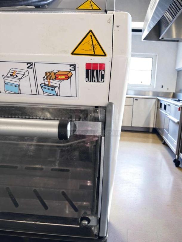 JAC SFN 450/12 self-service bread slicer, 12mm slice, premium condition, 120V, UL listed, with usage instructions.