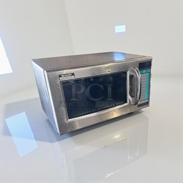 Sharp R-21LV Commercial Microwave, 1000W, stainless steel, fully tested, excellent condition, visible control panel and markings.