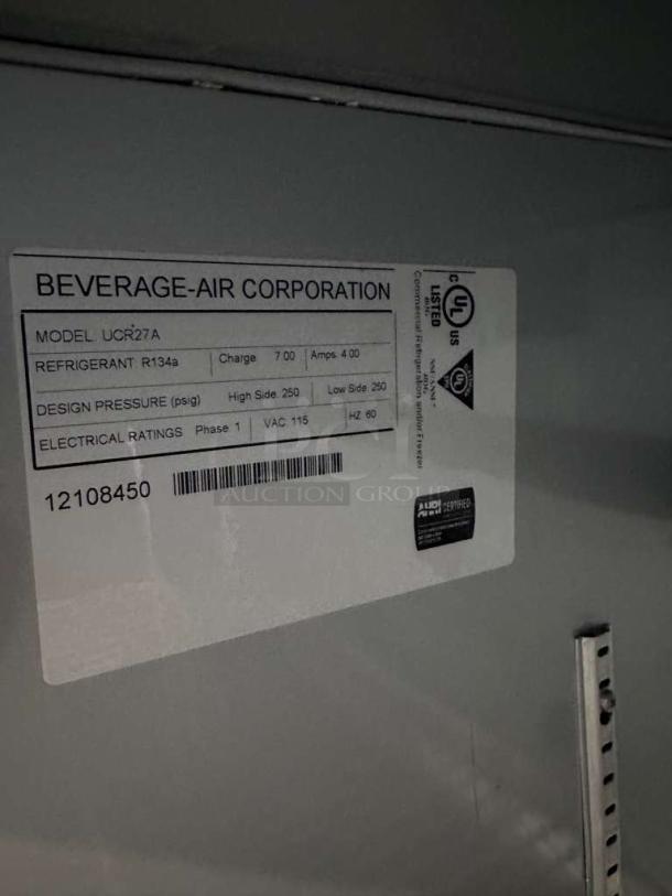 Beverage-Air UCR27A undercounter refrigerator label showing model, refrigerant R134a, electrical ratings, and UL certification.