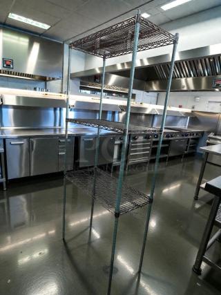 Commercial 4-tier wire shelving rack, heavy-duty, NSF style, excellent condition, fully inspected, item STO-S-RACK-0355.