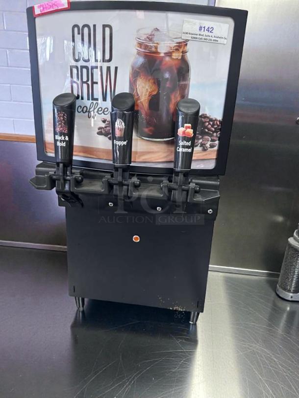 GoodWest GW2/GW3 commercial cold brew dispenser, excellent condition, three dispensers labeled Black & Bold, Frappe, Salted Caramel.