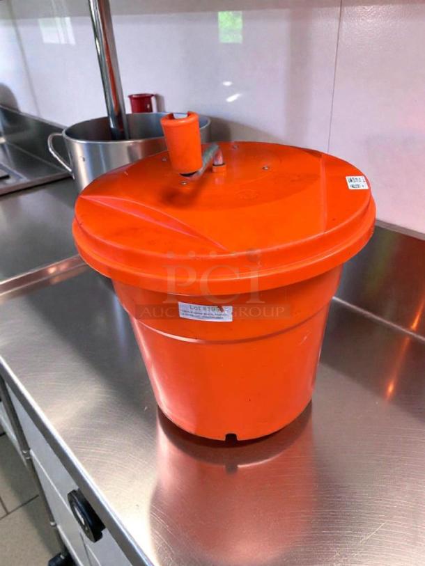 Orange commercial utility container with lid and drain valve, labeled "Lot 1483." NSF certified, fully operational in good condition.