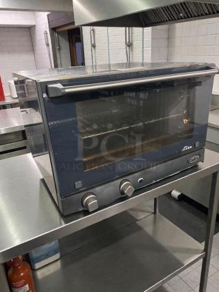 Cadco OV-013 / XAF-013-US commercial countertop convection oven, stainless steel, NSF & UL listed, refined condition.