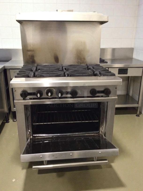Connerton 6-burner gas range with oven, commercial model, natural gas, excellent condition, fully tested.