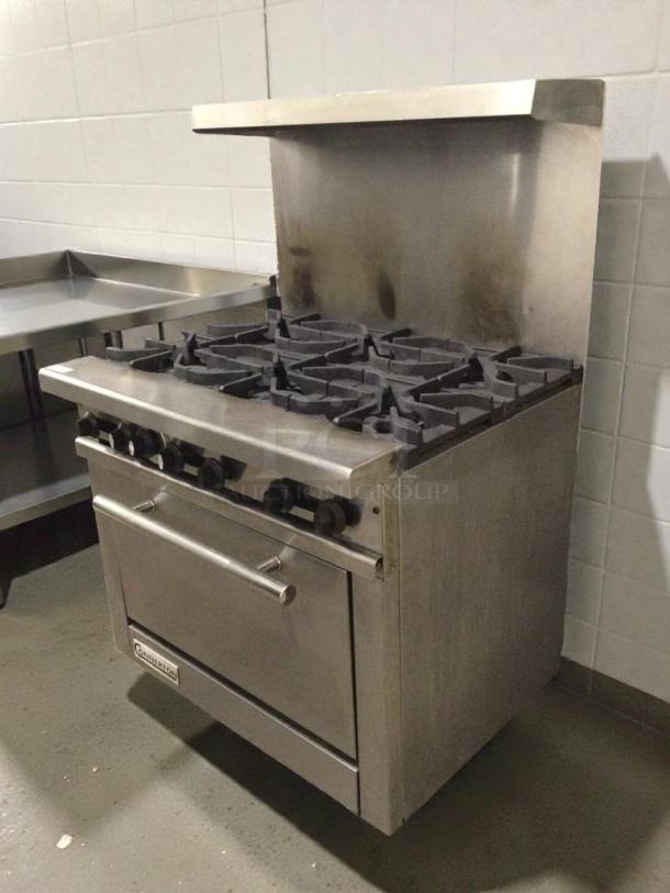 Connerton 6-burner gas range with oven, model CON-L-RNG-0147, in excellent condition; stainless steel, tested and working.