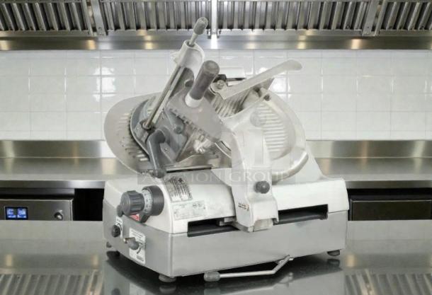 Refined Hobart 2912 commercial meat slicer, 120V, single phase, fully tested, excellent condition, visible control dials.