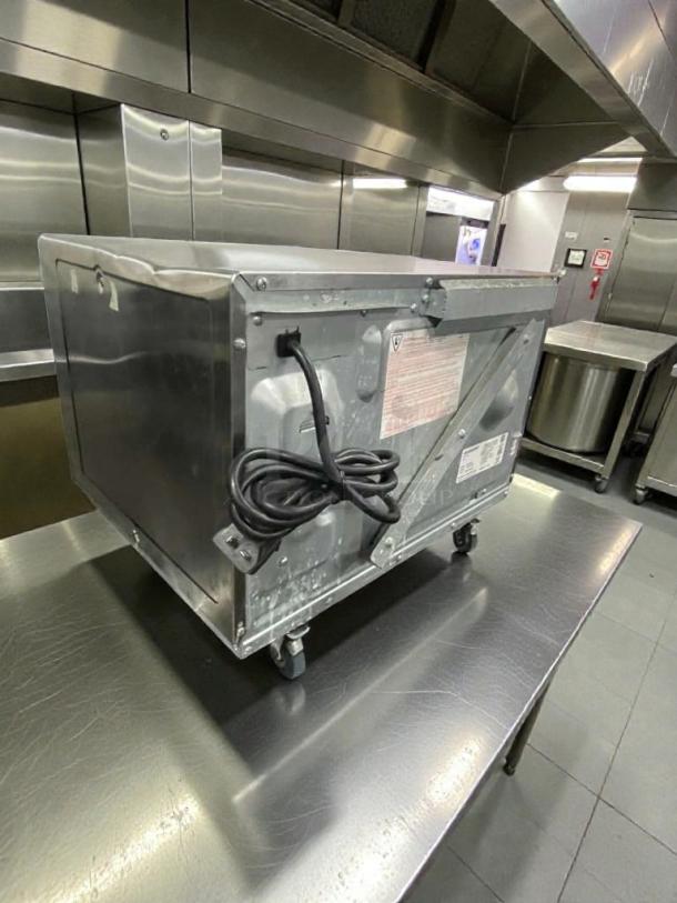 MenuMaster MFS18TS commercial microwave in outstanding condition, 208/240V, single phase, fully tested, back view with cord.