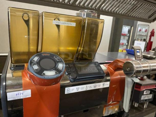 Nuova Simonelli Mythos Series coffee grinder in excellent condition, dual hoppers, digital display, polished exterior, model #171.