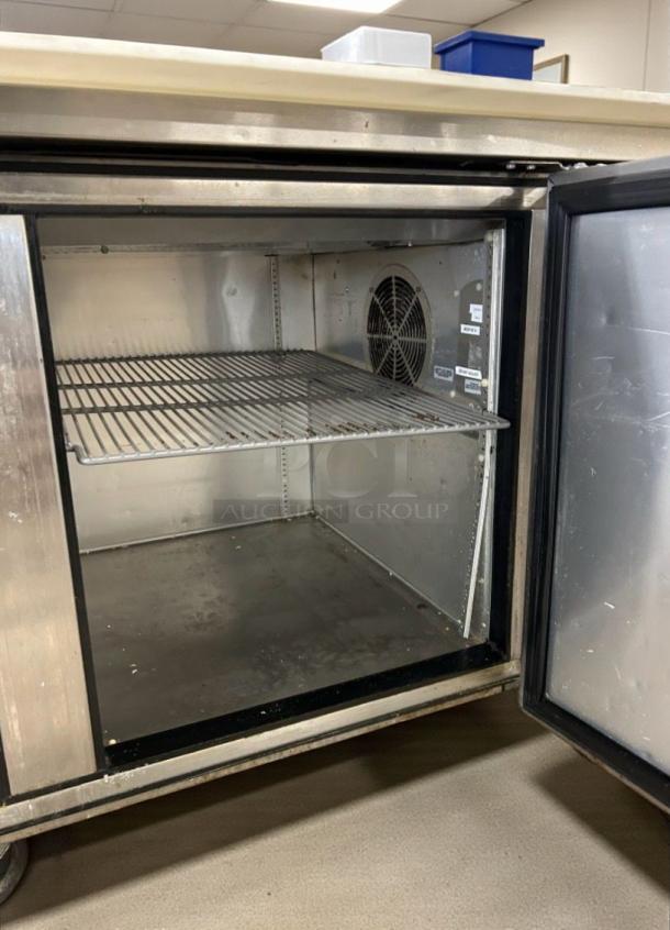 True TPP-93 commercial refrigerated prep table, premium condition, single phase 115V, fully tested, open door view.
