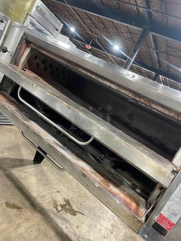 Bari stainless steel gas pizza deck oven, Model M648M, single stacked with stones. Shows signs of use, on legs. SN: 2621.