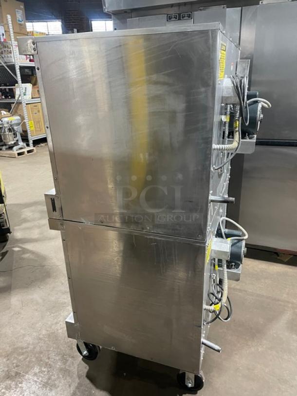 Vulcan Commercial Stainless Steel Double Stacked Convection Oven, model VC4GDSEFCCC, on casters. Wired rack inside.