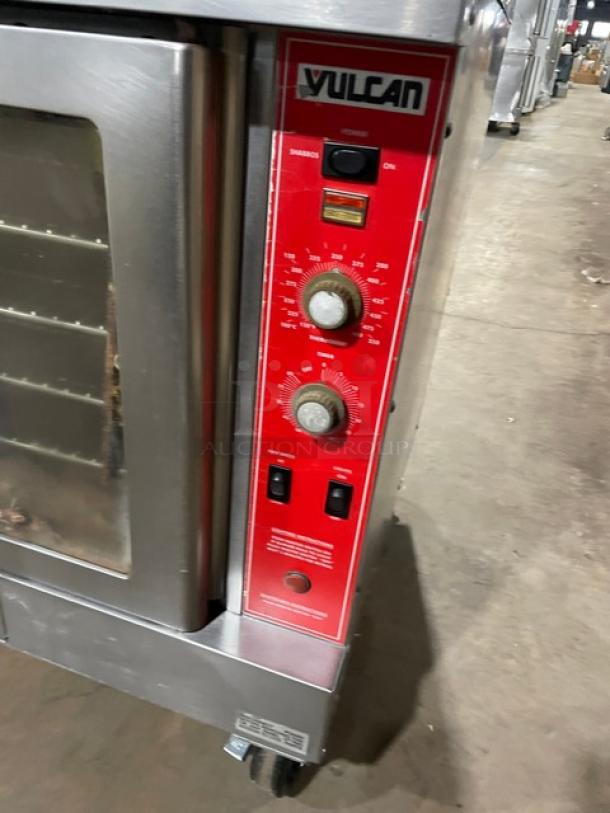 Vulcan commercial stainless steel gas convection oven, model VC4GDSEFCCC. Features: double stack, wired rack, casters.