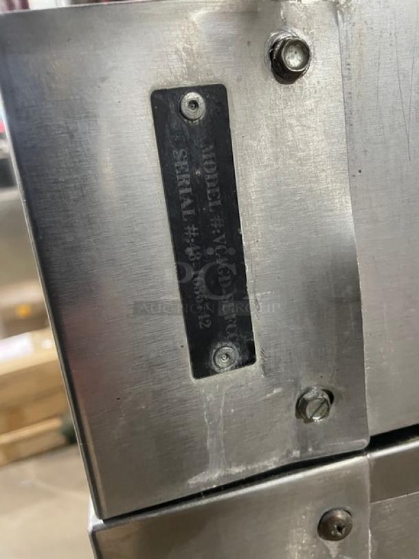 Vulcan Commercial Stainless Steel Double Convection Oven, Model VC4GD-SEFCCC, serial 48-1636742, on casters with wired rack.