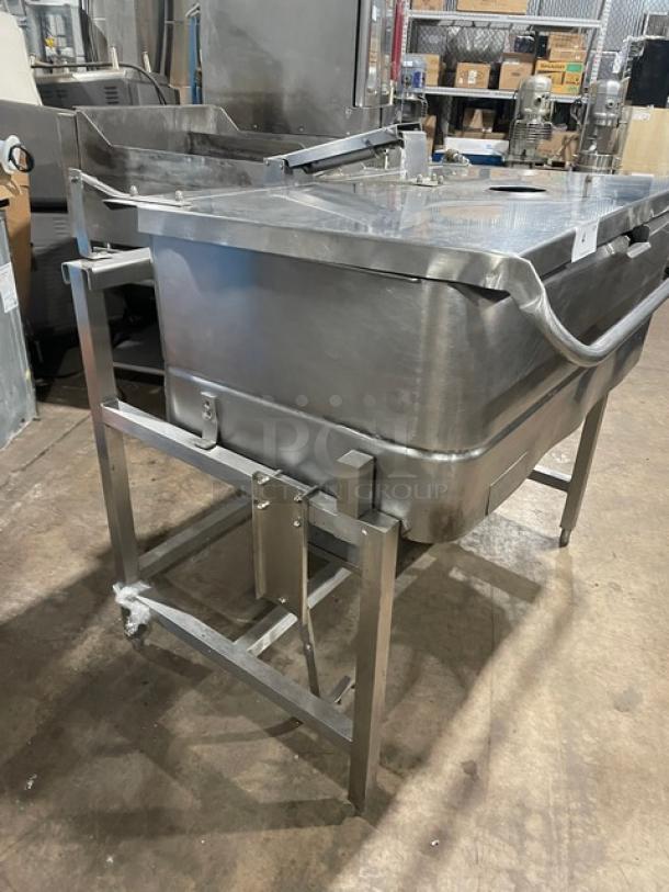 Groen 40 gal. stainless steel tilt skillet, model NHFPE4, on legs with single spout faucet. Natural gas-powered, 1 phase.