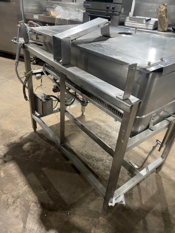 Groen NHFPE4 stainless steel 40 gal. tilt skillet/braising pan. Natural gas, single spout faucet, on legs.