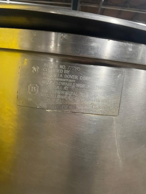 Groen FT80 stainless steel steam kettle, 80 gal capacity, tri-leg base, model SN 72285, direct steam, label visible.