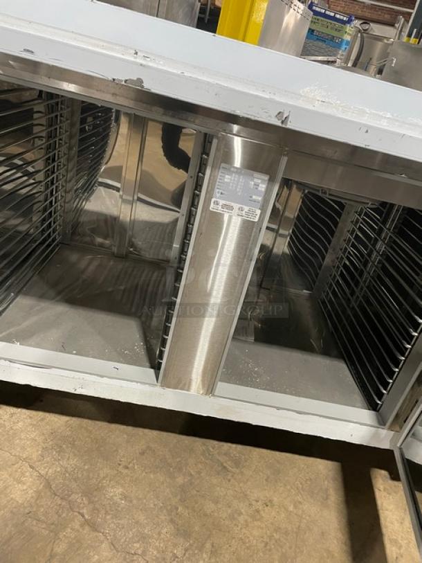 Custom Cool Commercial 3 Door Stainless Steel Refrigerated Worktop Table, Model LB93. Features upturned backsplash, built-in pan rack, SN: B2018075, one phase, on casters.