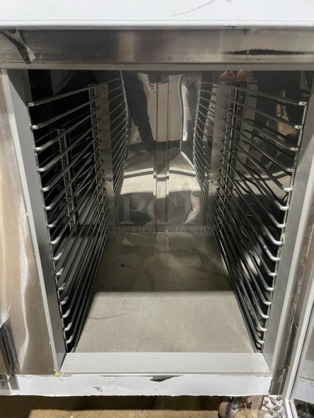 Custom Cool stainless steel refrigerated worktop table, 3 doors, model LB93, built-in pan rack, upturned backsplash, on casters.