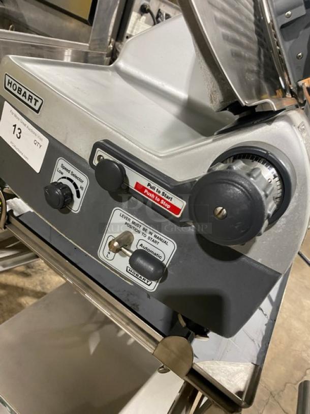 Hobart 2912 Commercial Electric Deli Meat Slicer, 120V, countertop model with brand new undershelf slicer-mounting cart. Serial No. 561-183-521.
