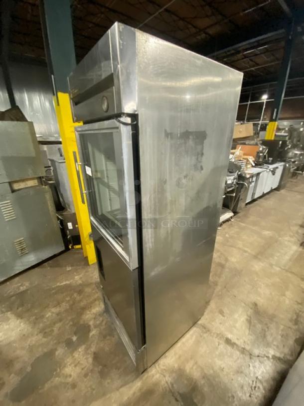 True T-23-1-G-1 stainless steel reach-in refrigerator with glass/solid half-door, model T231G1, includes poly-coated wired rack.