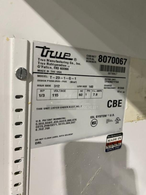 True T-23-1-G-1 refrigerator tag showing model, serial number, voltage, and specs. Made in USA.