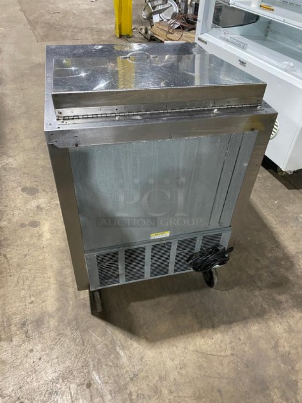 Beverage-Air SP27 stainless steel refrigerated prep table on casters, featuring poly-coated wire rack. Model: SP27, 115V, 1 phase.