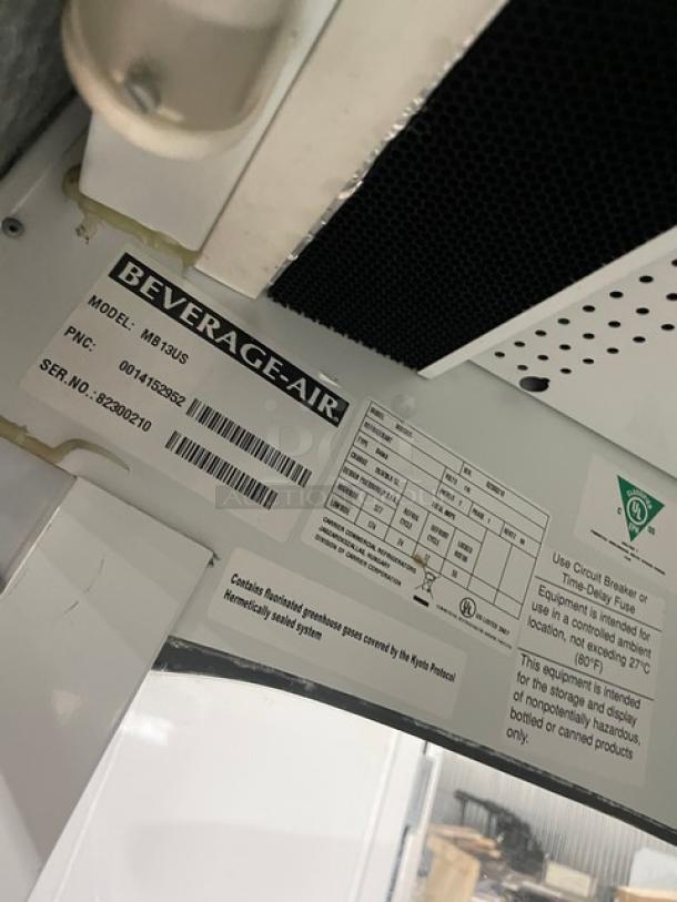 Beverage-Air commercial refrigerated display case, model MB13US, adjustable shelving, 115V, Serial No: 82300210.