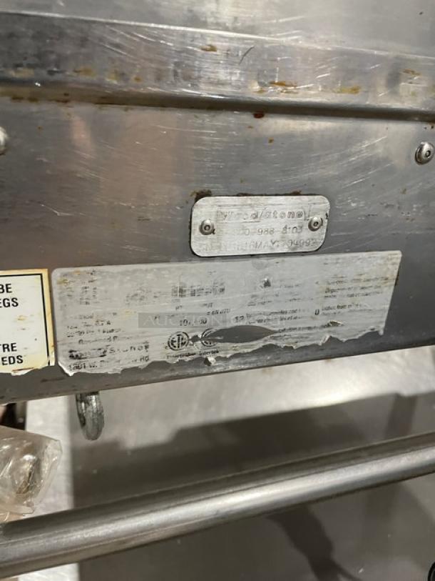 WoodStone Commercial Stainless Steel Gas Griddle, 48" with back/side splash, SN: GP1B16MAY1704992, on casters, single undershelf.