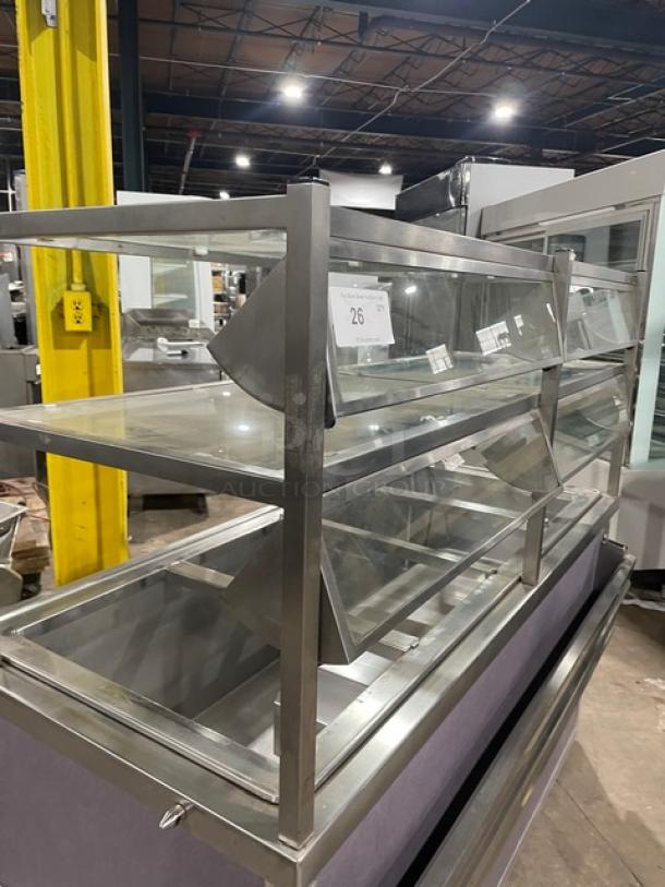 Atlas Metal 60" stainless steel refrigerated salad bar with sneeze guard, tray slide, and dry storage. Model WCMBT4, on casters.