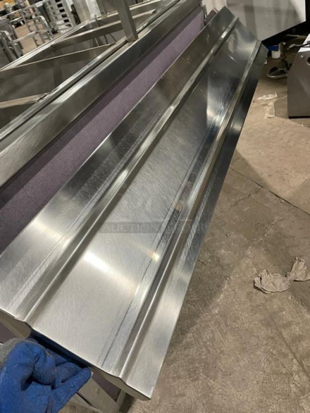 Atlas Metal WCMBT4 stainless steel 60" buffet refrigerated salad bar with sneeze guard, tray slide, and storage cabinet.