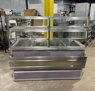 Atlas Metal stainless steel 60" refrigerated 4-well salad bar with sneeze guard, tray slide, and enclosed storage. Model WCMBT4.