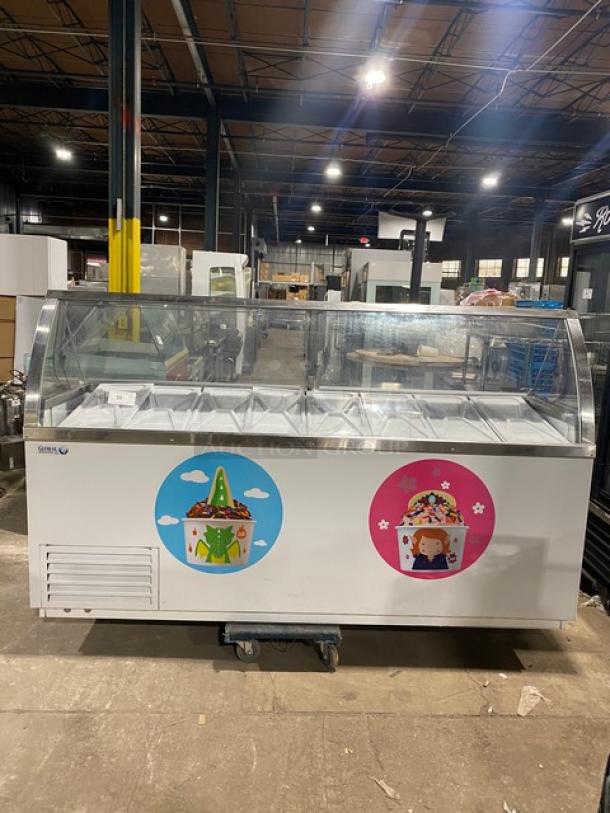 Global Baskin Robbins-style commercial ice cream cabinet, white, dual lift-open doors, with tub holders, decals on front.