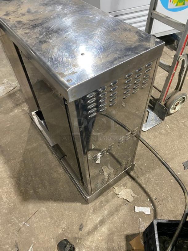 Robot Coupe stainless steel electric rotisserie cabinet, countertop model, with legs. Good condition, vented sides.