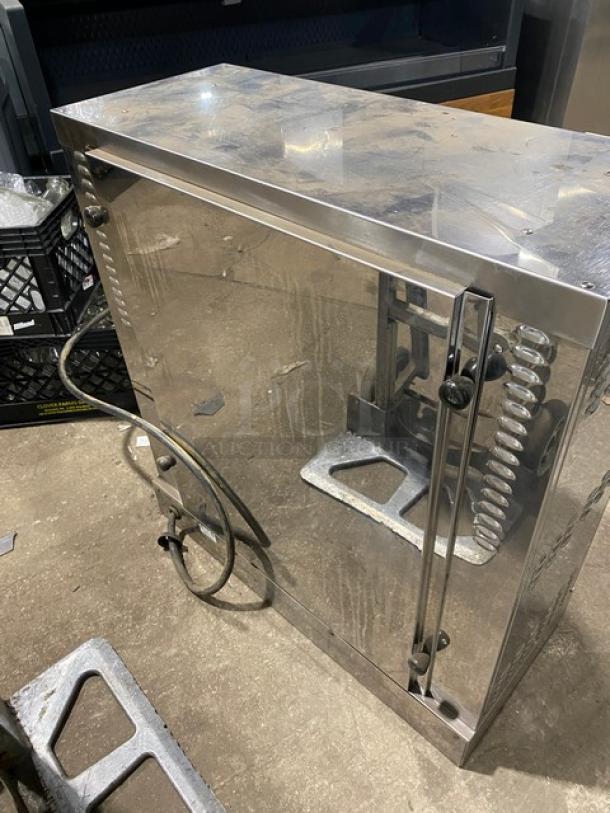Robot Coupe stainless steel electric countertop rotisserie cabinet with legs, visible power cord, minor wear.