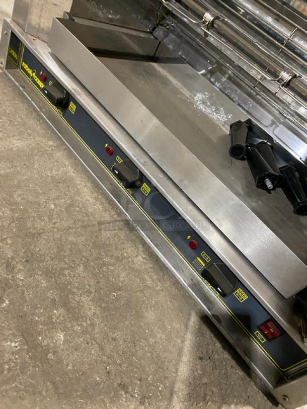 Robot Coupe Commercial Stainless Steel Electric Rotisserie Cabinet with legs, control panel, used condition.