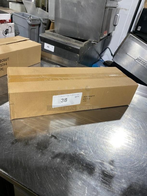 Adcraft Commercial Condiment Holder SSCH-6 in box, new condition, with clear acrylic lid and white polyethylene inserts.