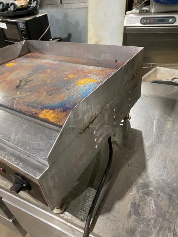 Cecilware EL1624 stainless steel griddle, 24" electric with thermostatic control, back and side splash, on legs, used condition.