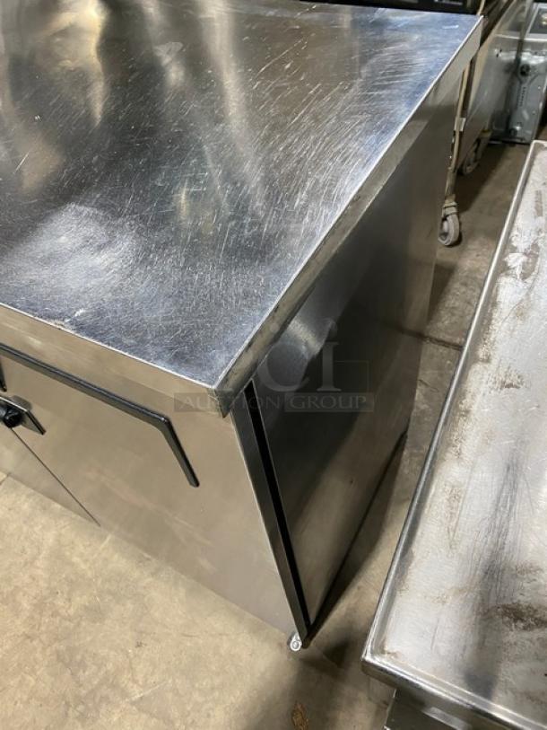 True Commercial Stainless Steel 2 Door Back Bar Cooler, Model TBB-2448S, includes black coated wired rack, good condition.