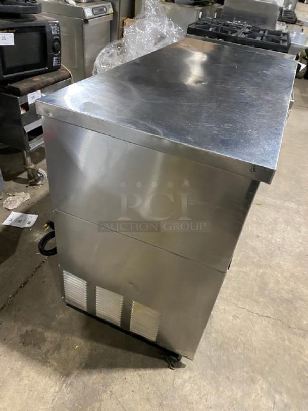 True TBB-24-48S stainless steel 2-door back bar cooler, black coated wired rack, 115V, 1 phase, SN: 1-4627806, used condition.