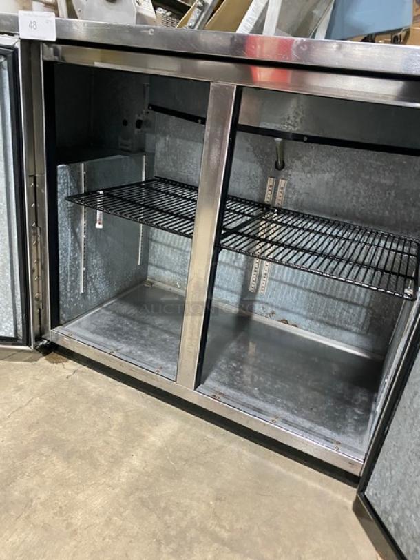 True TBB-24-48S stainless steel 2-door back bar cooler with black-coated wired rack. Model TBB2448S, 115V, 1-phase.