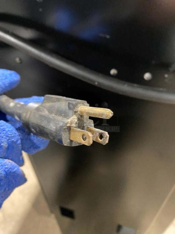 Cookshack Model 150 electric smoker oven cord, close-up. Features digital control, 110V, on casters.