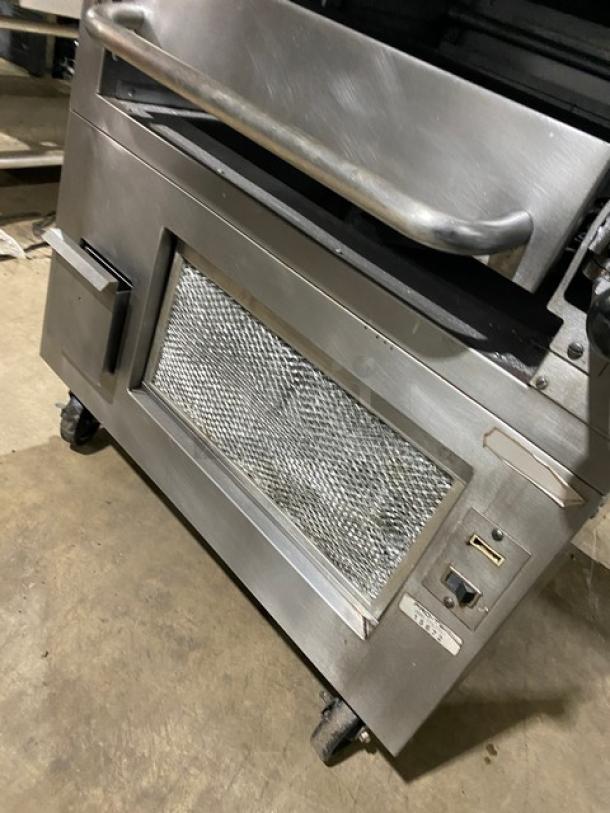 Southbend stainless steel gas-powered double deck infrared broiler, upright, on casters, commercial-grade, durable condition.