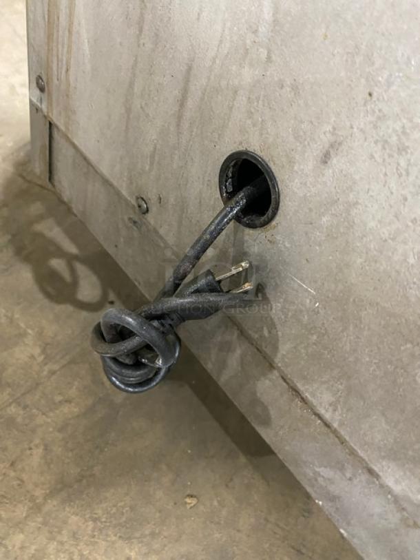 Southbend commercial stainless steel gas-powered upright double deck infrared broiler, on casters, visible power cable.