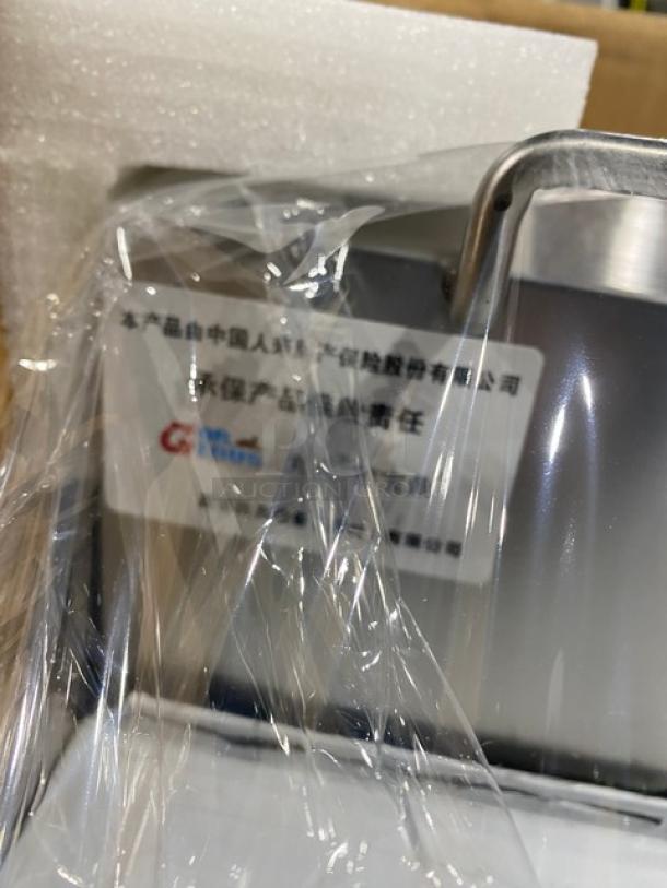 Gaoji 1 MHGF2T46F commercial stainless steel gas fryer, new condition, wrapped in plastic, includes product labels.