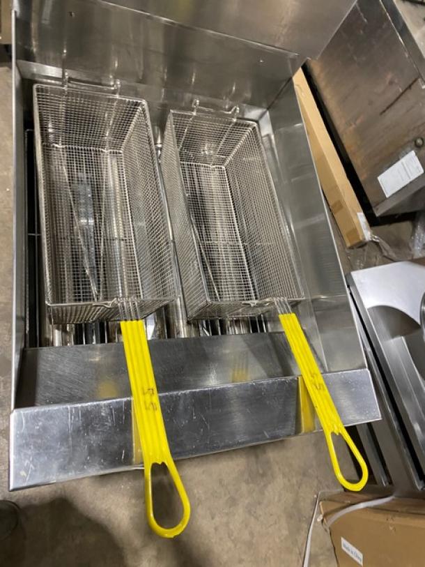 Keating Instant Recovery Series commercial stainless steel gas fryer with backsplash, basket hanger, fry baskets, and legs.